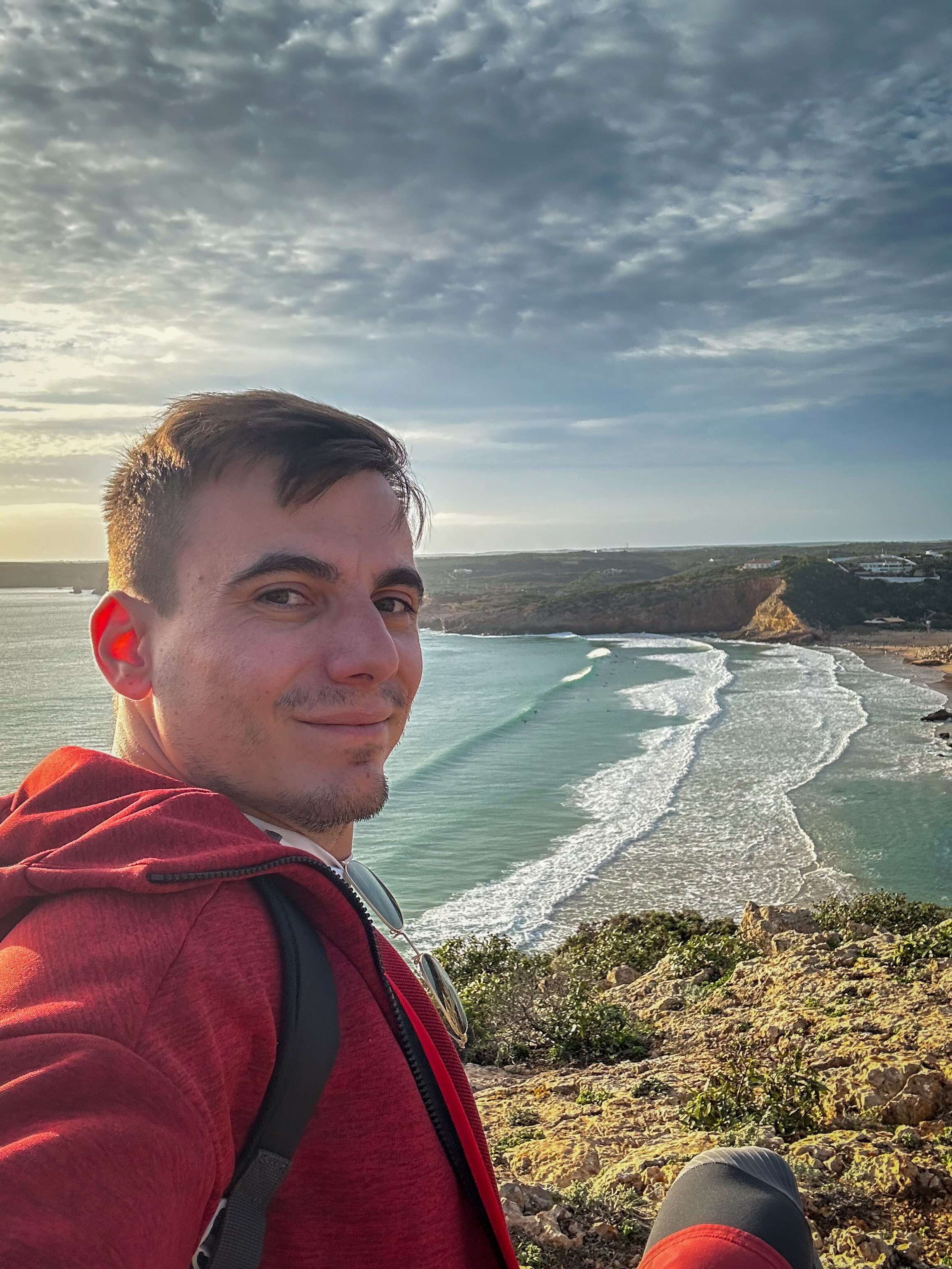 selfie over a beach in algarve while hiking