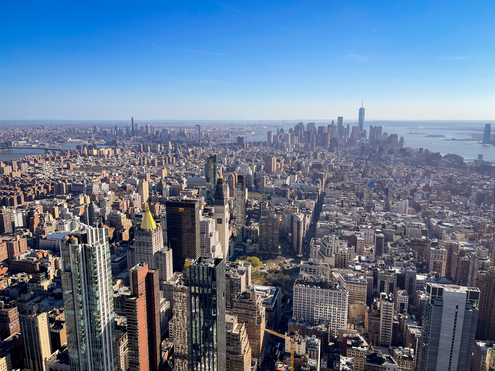 view over manhattan from the empire state building, photo by silviu alexandru avram