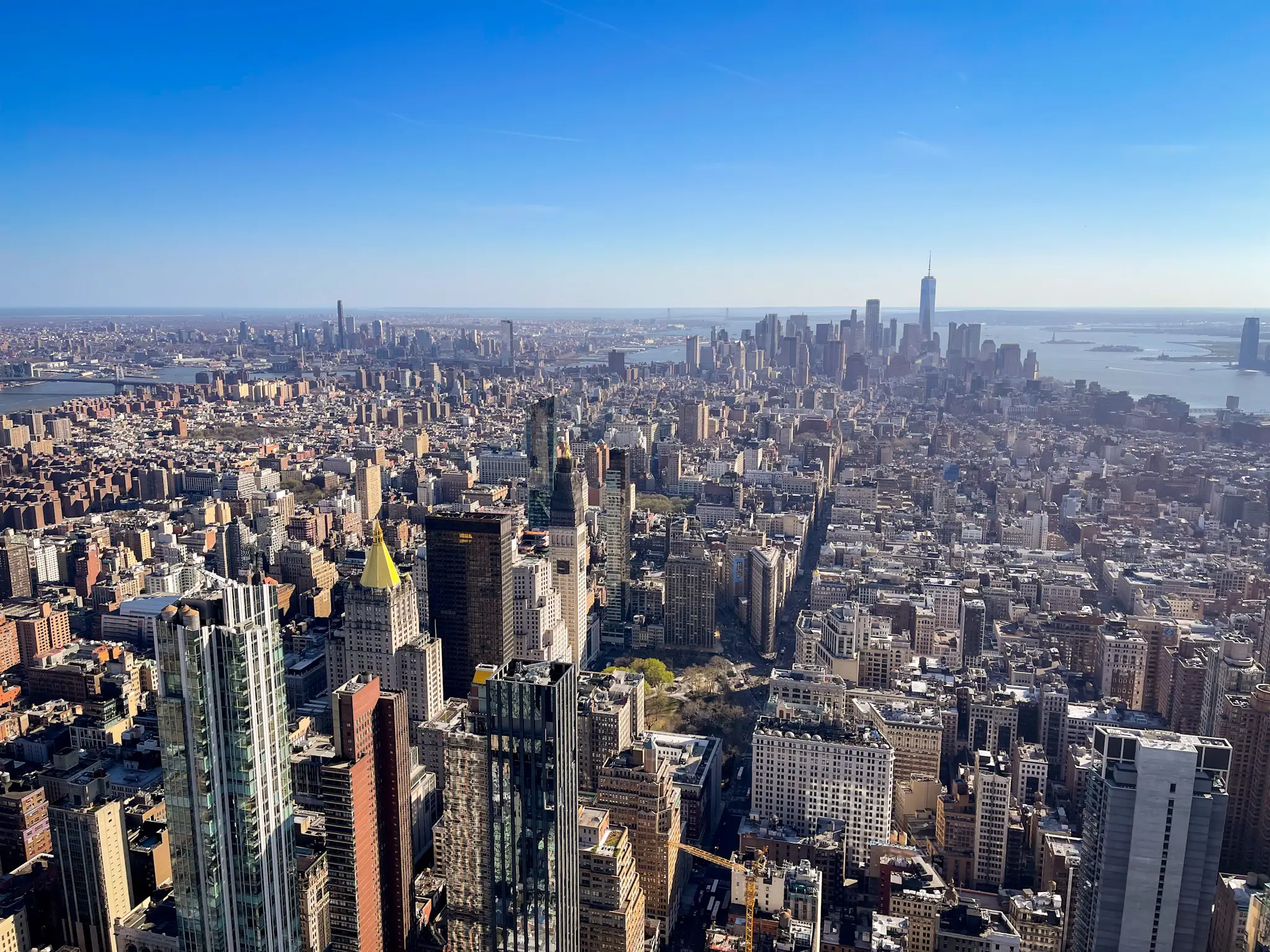 view over manhattan from the empire state building, photo by silviu alexandru avram