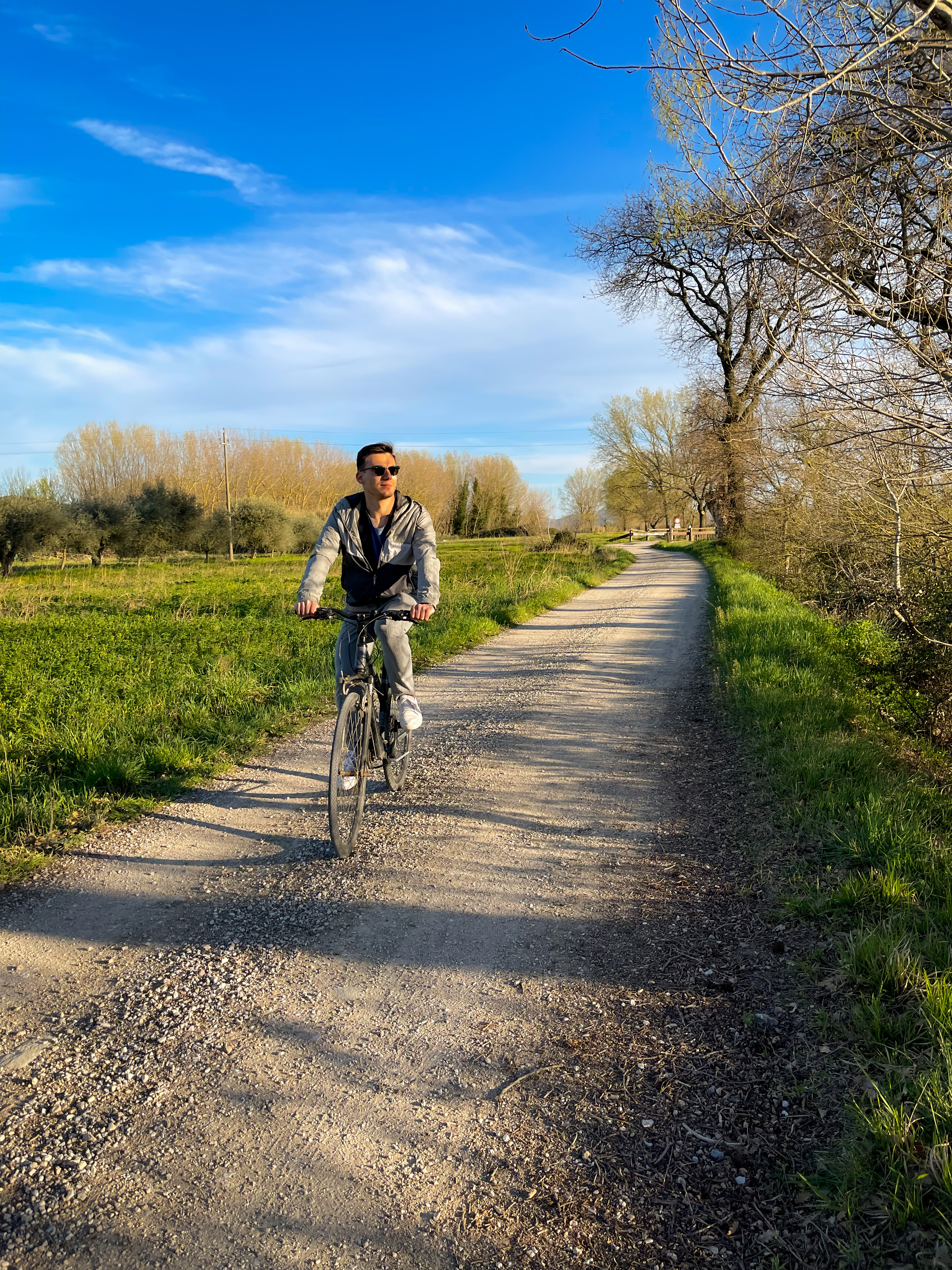 silviu on a bike near trasimeno