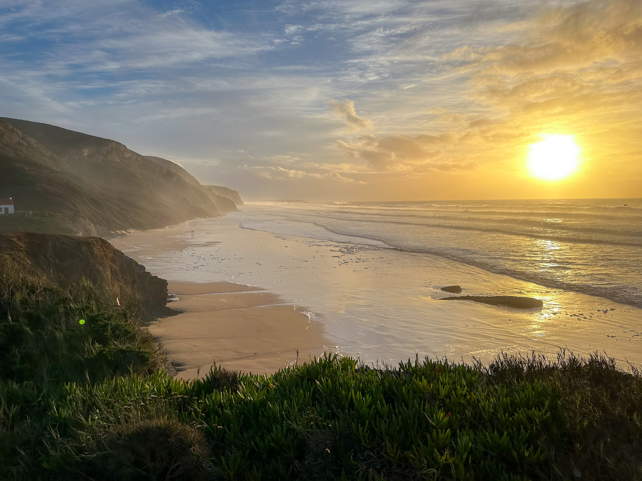 praia de vale figueiras at sunset