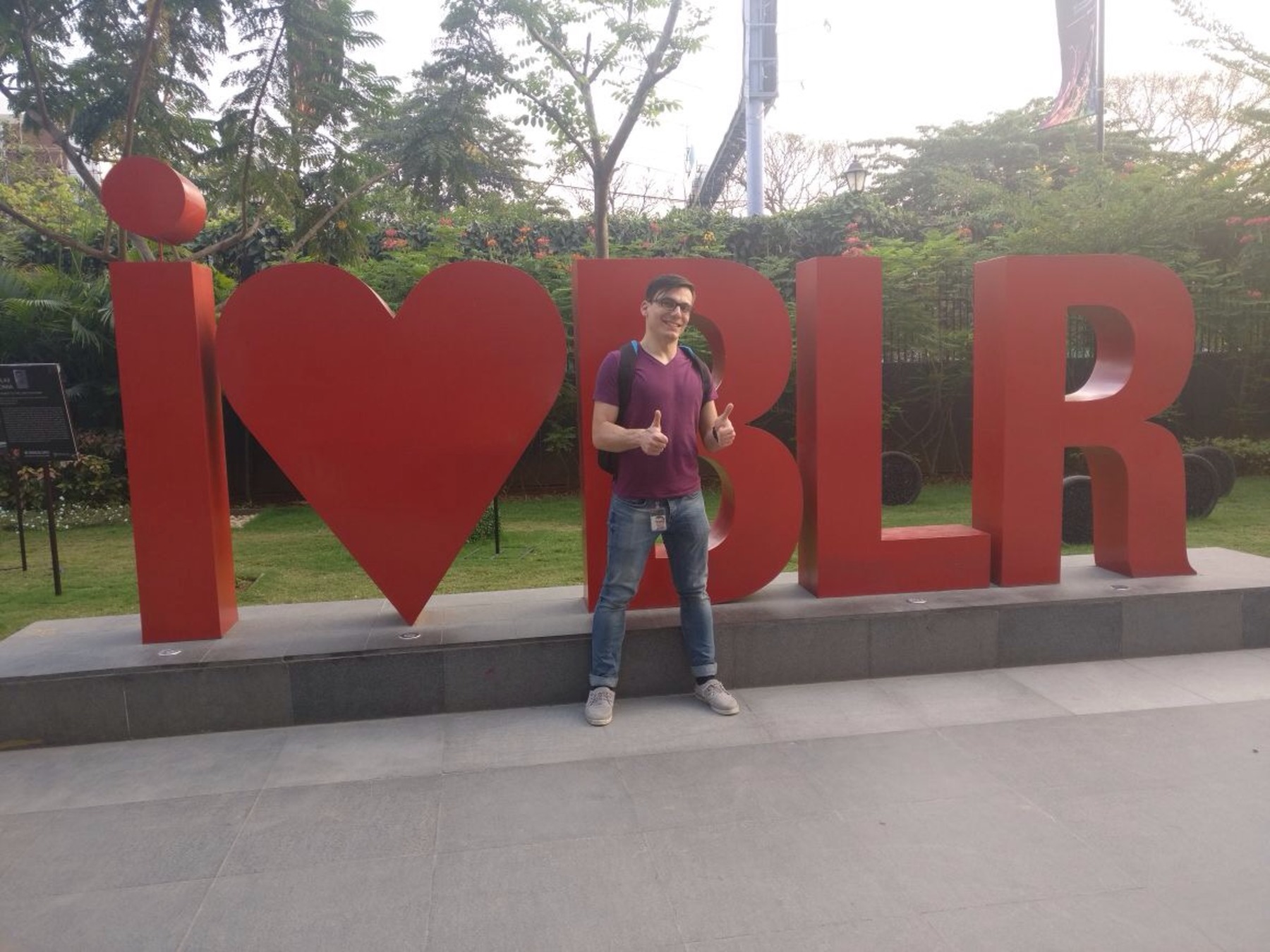 silviu next to an i love bangalore sign